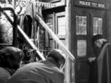 Barbara and Ian watch The Doctor Enter the Police Box