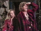 Romana and The Doctor Exit the TARDIS